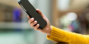 Woman holding smart phone